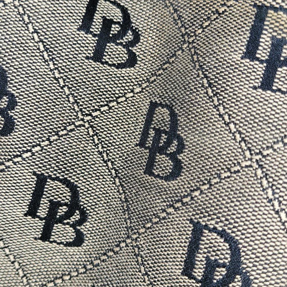 Very Nice Dooney and Burke purse!! Unique strap!